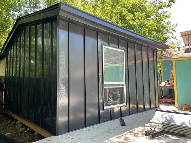 Black standing seam metal wall panels for Metal Roof Installation in Cumberland